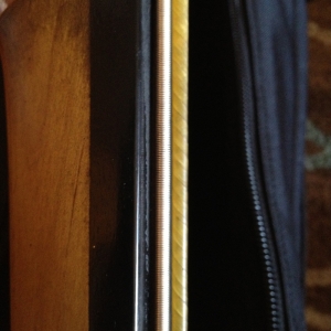 Side by side comparison of steel wrapped E string and full gut A string